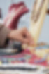 vecteezy_woman-selecting-jewelry-at-a-market-stall_75188612.jpg