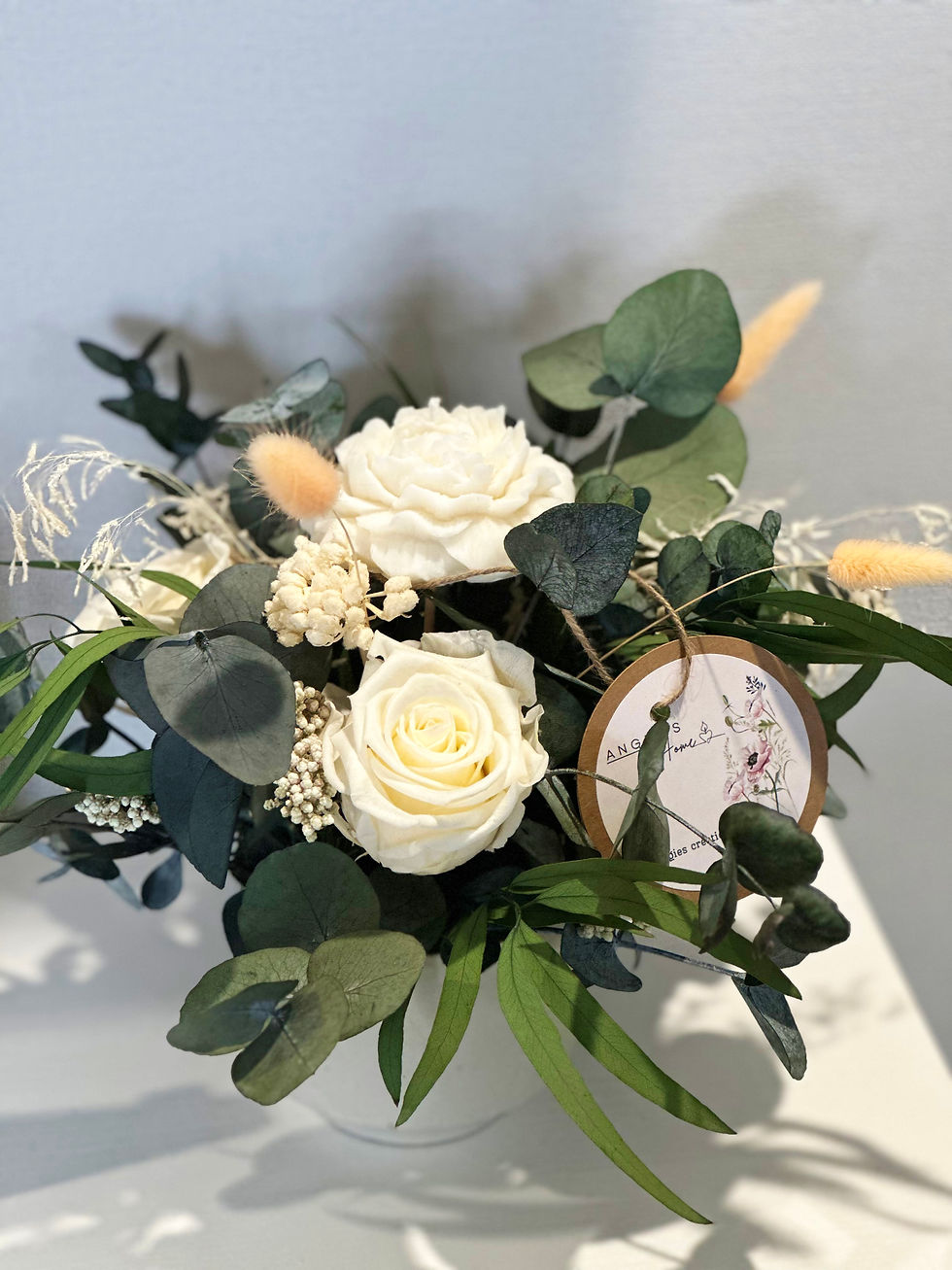 Composition florale bougies et végétaux stabilisés