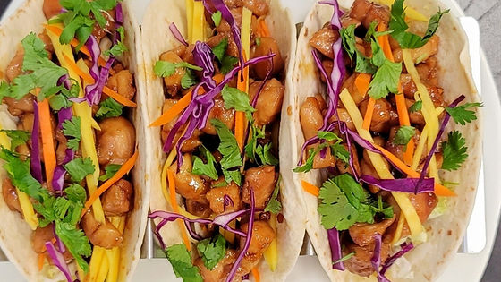 2 Bulgogi Soft Tacos, Choice of Steak, Chicken, or Veggie