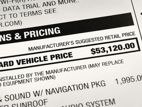 Vehicle window sticker showing a new car price of $53,120, illustrating rising vehicle prices and the affordability challenges facing car buyers.