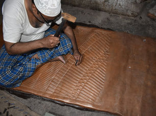 Hamid Bhai , part of Aluminr’s artisanal group , performing the art of Copper embossing