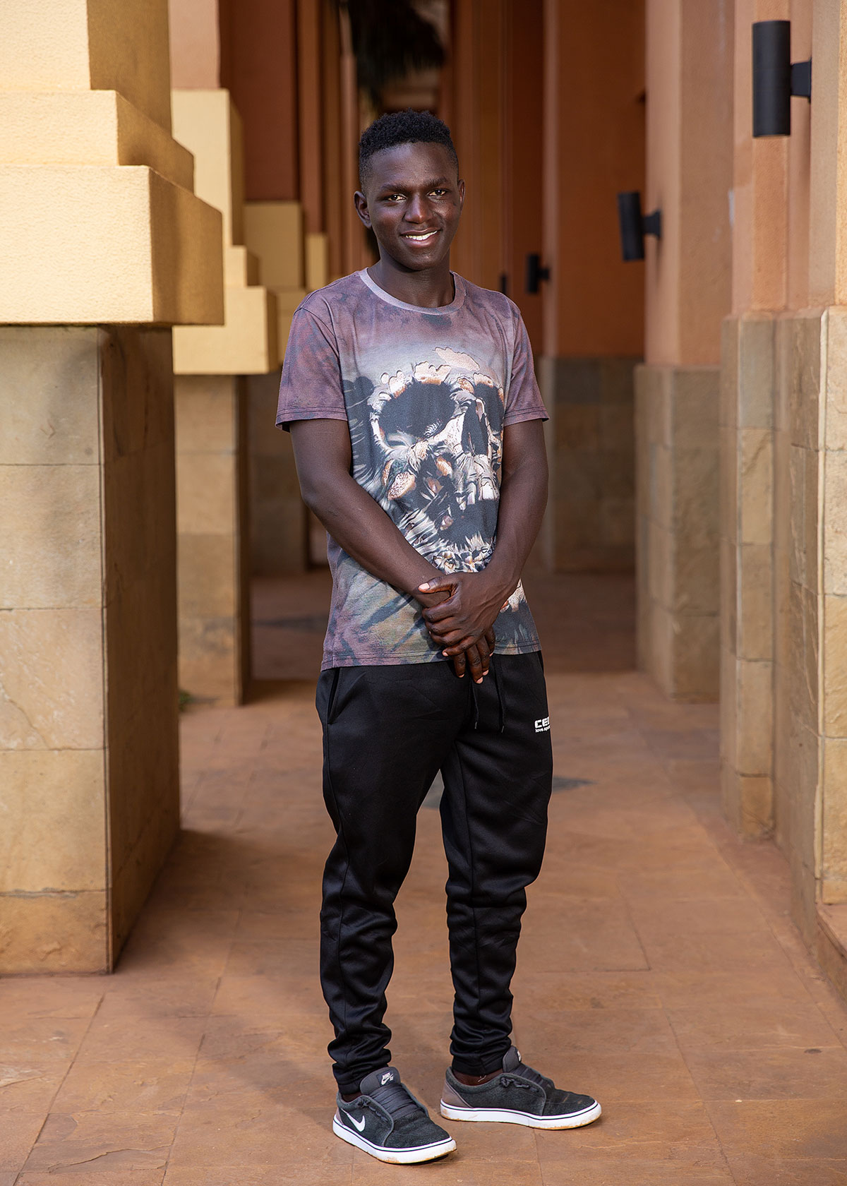 young-man-kampala-nike-shoes-5x7