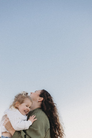 mum throws daughter in air 