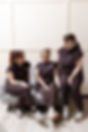 nurse georgi, nurse danni and nurse shelley sat on sofa laughing