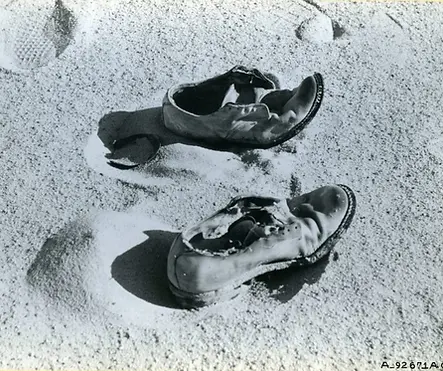 Shoes-left-in-the-desert-as-navigational-markers-by-the-crew-1024x810.webp
