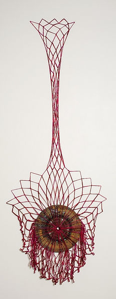 fiber (yarn) sculpture with metal car part using net making technique