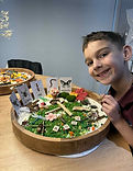 Child exploring a sensory learning kit with hands-on materials, supporting fine motor and early literacy development.