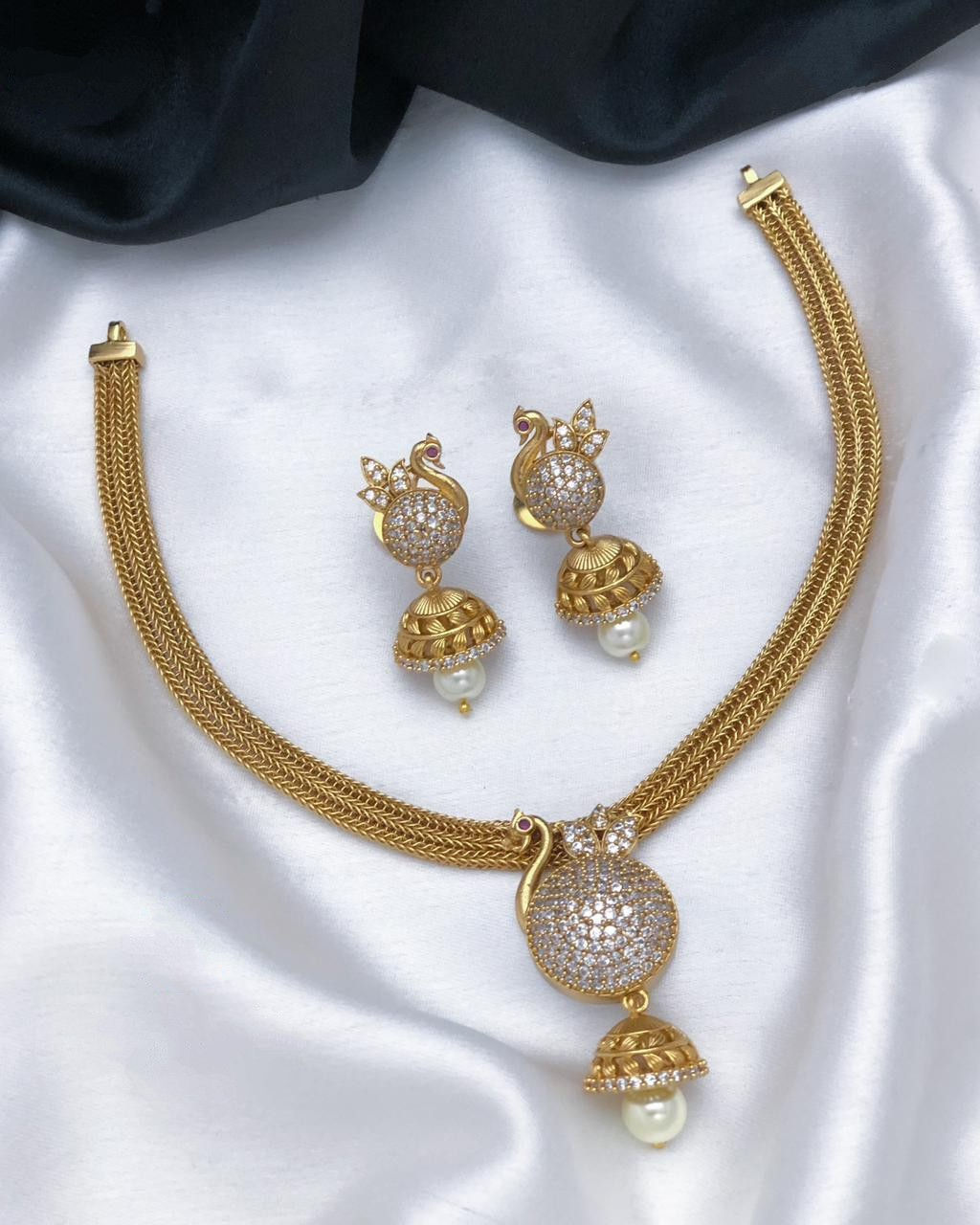 AD stone chocker Necklace with Jhumkas 