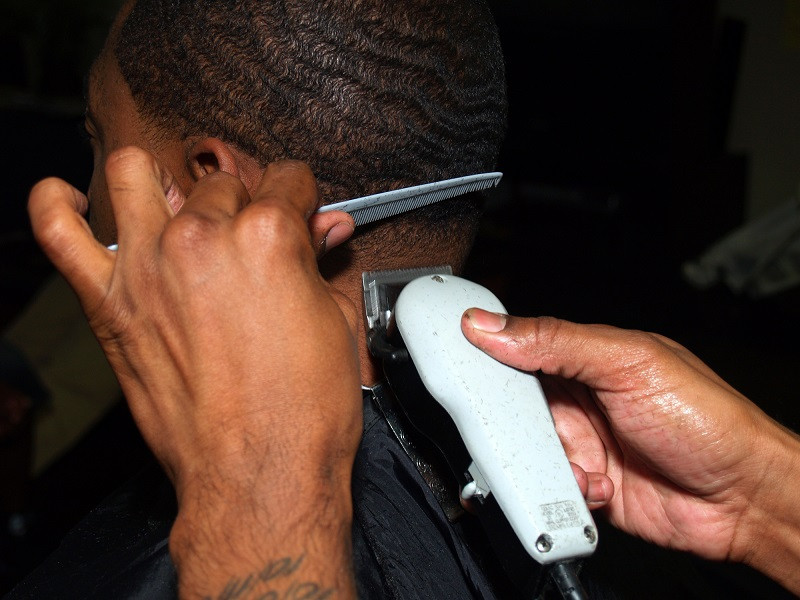 Barber Gives Haircut