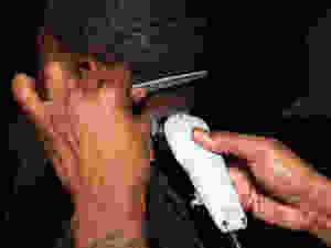 Barber Gives Haircut