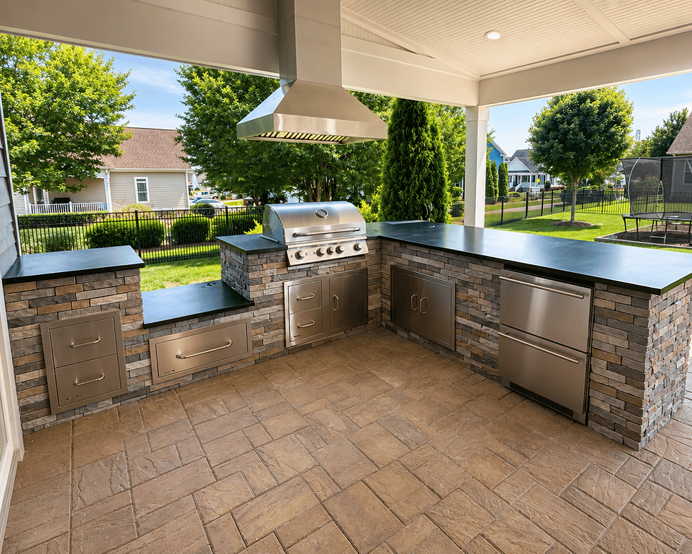 L-shaped outdoor kitchen with hood vent and stone veneer under covered patio in Charlotte NC