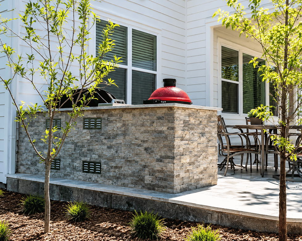 Blaze built-in stainless grill outdoor kitchen with stacked stone and granite countertop in Charlotte NC