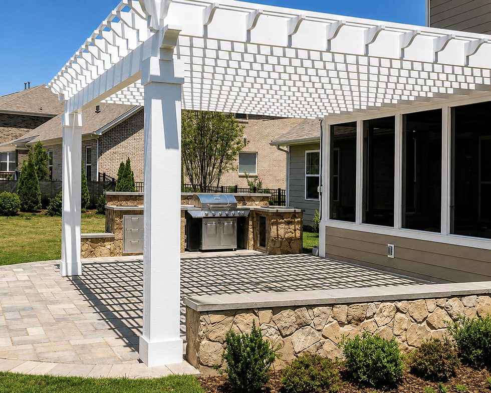 White pergola over paver patio with outdoor kitchen and stainless grill in Charlotte NC