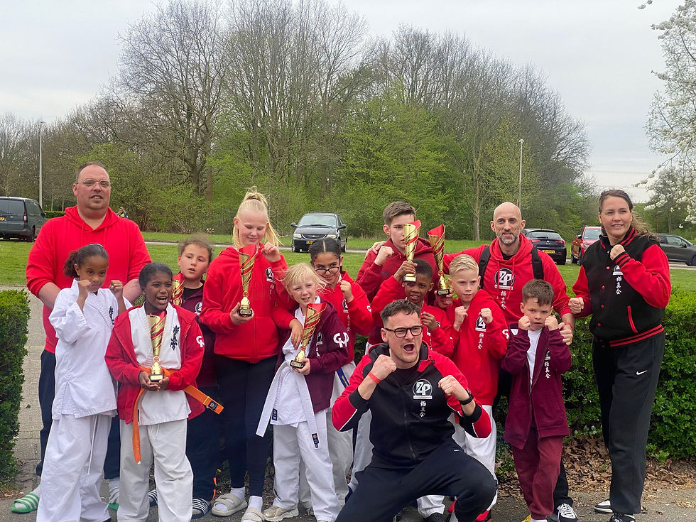 Het team met de coaches.
