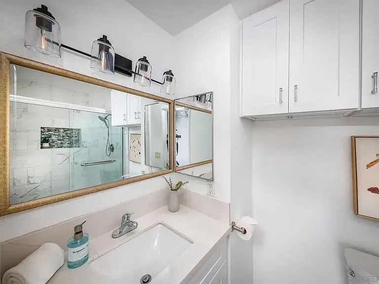 Bathroom vanity and mirror staging details