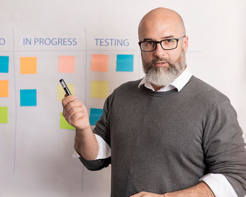 portrait-of-man-presenting-business-plan.jpg