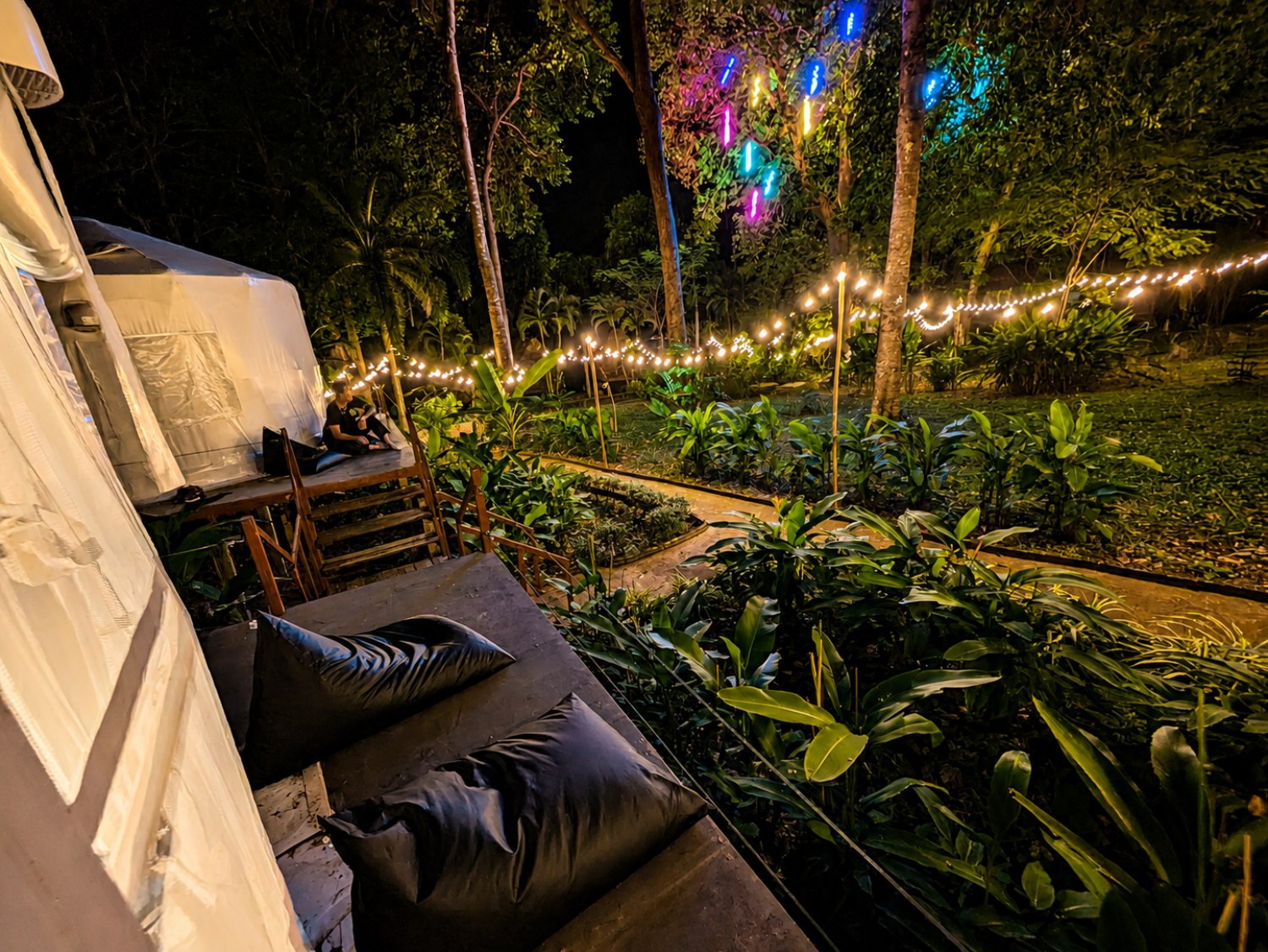 Private deck of a Glamping Yurt at night at Vanara Eco Resort