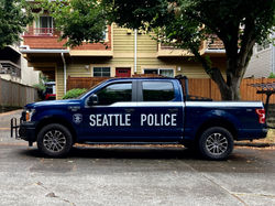 Seattle police pickup with bikerack