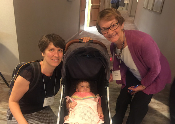 Dr. Virag Rab from Hungary introduces her infant daughter to Dr. Joan Miller from Pennslyv