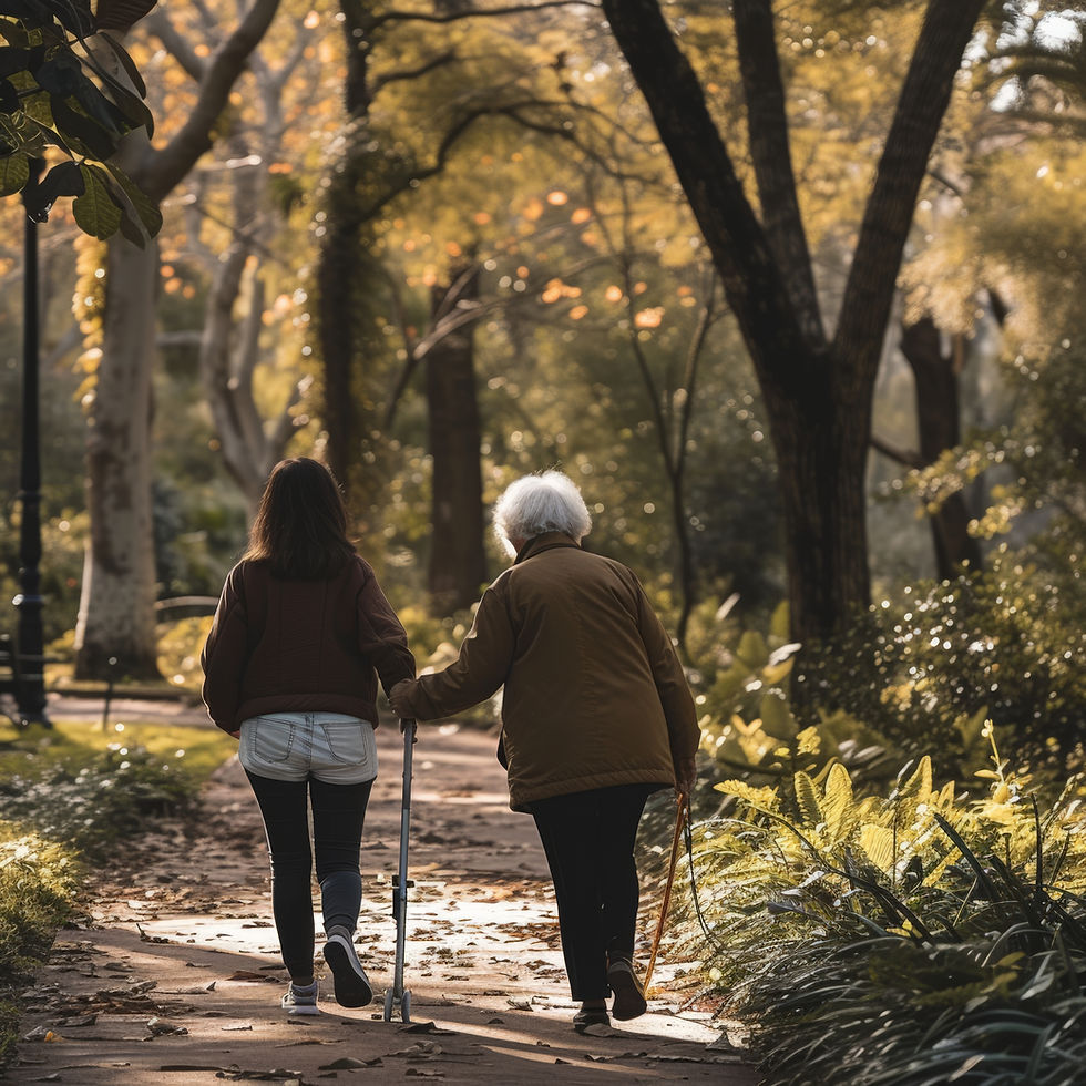 carer with a vulnerable adult walking through a park