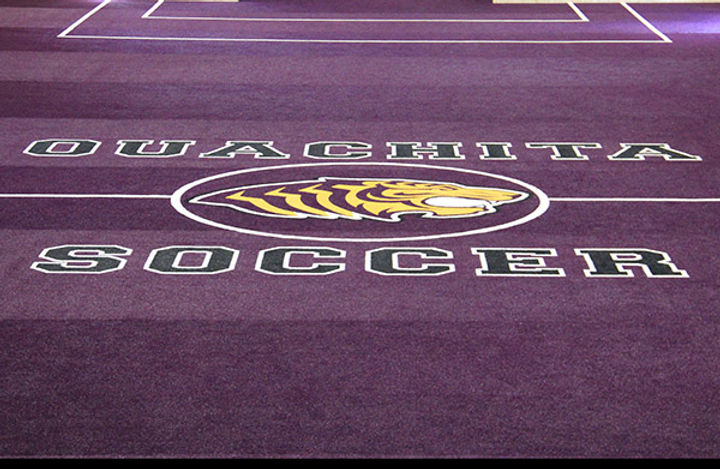 Ouachita synthetic turf indoor practice area built by Midwest Synthetic Turf Professionals.