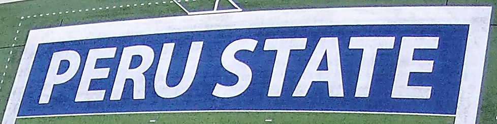 Peru State University synthetic turf football field end zone built by Midwest Synthetic Turf Professionals.