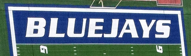 Raytown High School synthetic turf football field end zone built by Midwest Synthetic Turf Professionals.