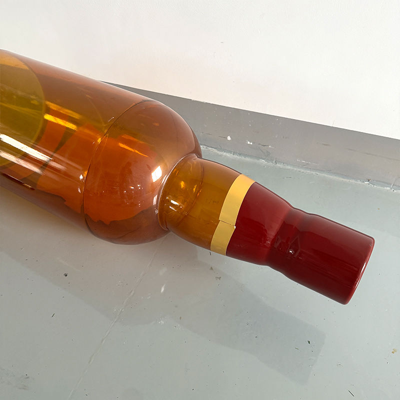 Thumbnail: Close-up of neck and red cap on custom giant liquor bottle display prop