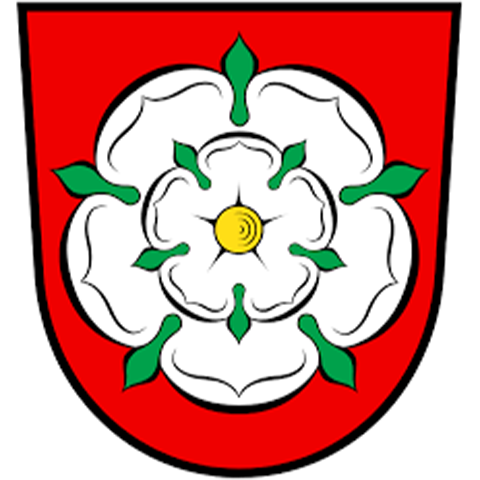 Wappen der Stadt Rosenheim mit goldenem Rad auf rotem Grund – repräsentiert die apoFinanz-Beratung im bayerischen Alpenvorland und steht für regionale Nähe und nachhaltige Finanzstrategien im Gesundheitswesen.