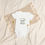 Thumbnail: Baby’s First Juneteenth – Organic Cotton Bodysuit (Baby Elephant Edition)