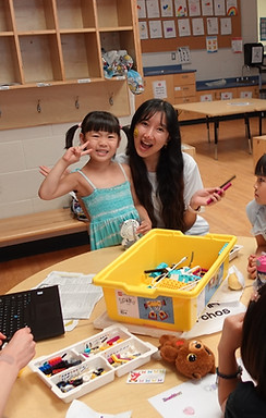 kids building with legos