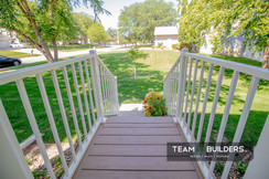 Custom stairs with composite decking and ADI railing in Cedar Falls, IA