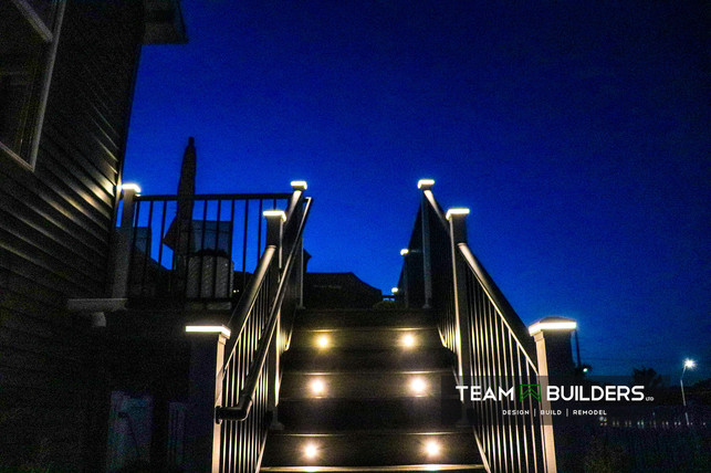 Composite deck in Cedar Falls, Iowa with riser LED lights and post cap lights