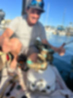 Who looks this happy repairing a stinky head?