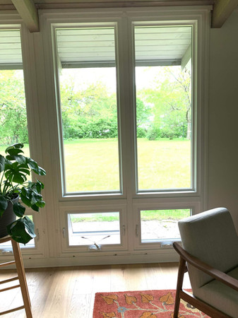 White Interior Picture Windows over Awnings