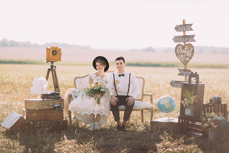 A couple sitting after a commitment ceremony, an amazing way to celebrate your love without legally being married. It can involve all the same traditions.