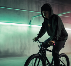 hoodie-mockup-featuring-an-ai-generated-man-riding-a-bike-m34915