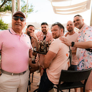 cafe del mar ibiza, sunset party, house music events, happy people smiling and posing, ibiza events