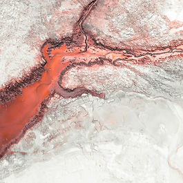 A wastewater substance in a puddle in the surface mining area.