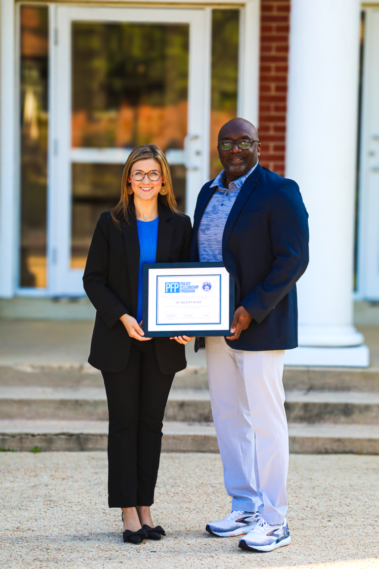 Co-Lin President Dewayne Middleton congratulates Scarlett Hart on completing Mississippi Community College Fellowship Program.