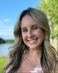 Professional nanny with tidy hairstyle.