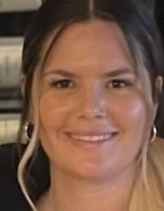 Nanny portrait with soft lighting.