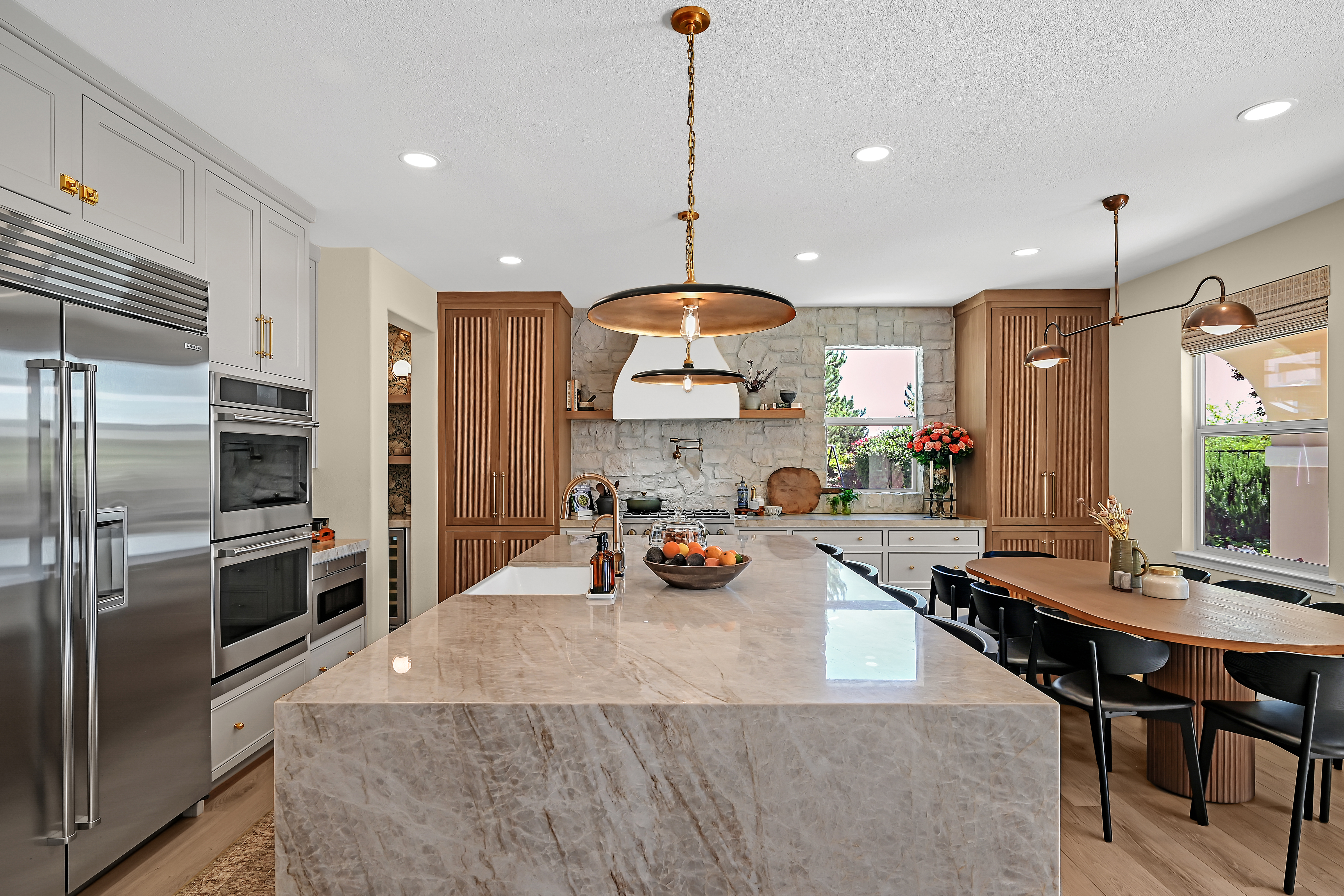 modern kitchen with large island and custom cabinets