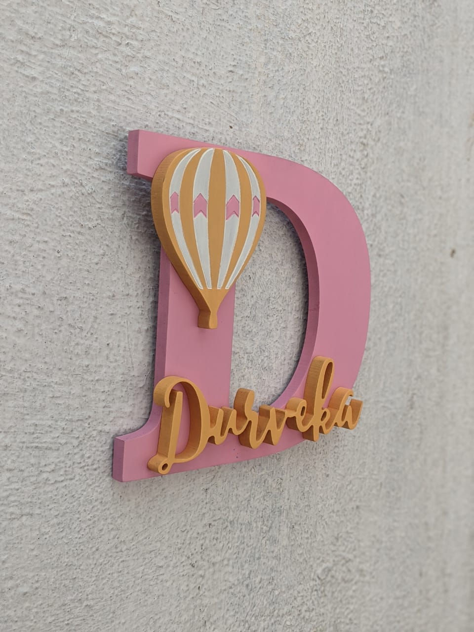 Thumbnail: Initial-Themed Name Board in pink and peach with hot air balloon