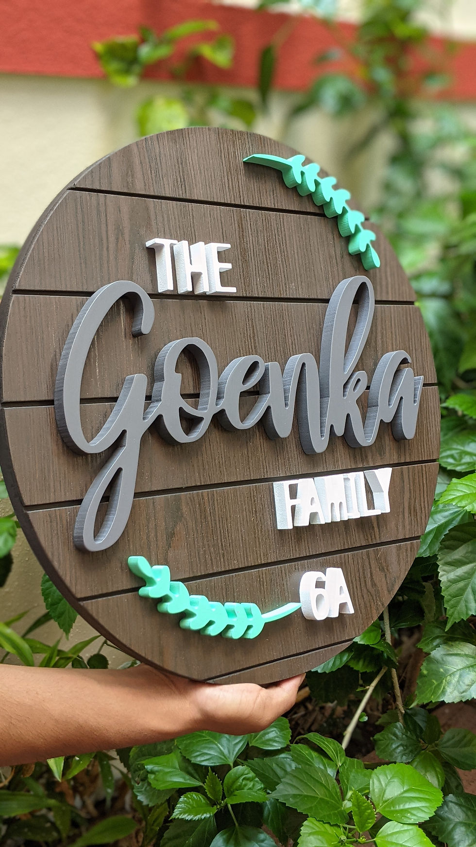 Thumbnail: Dark brown round nameplate