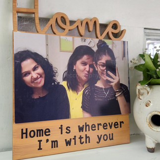 wooden plaque with words home is wherever i m with you