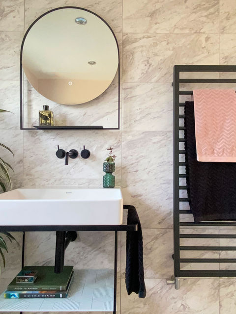sink and circular mirror
