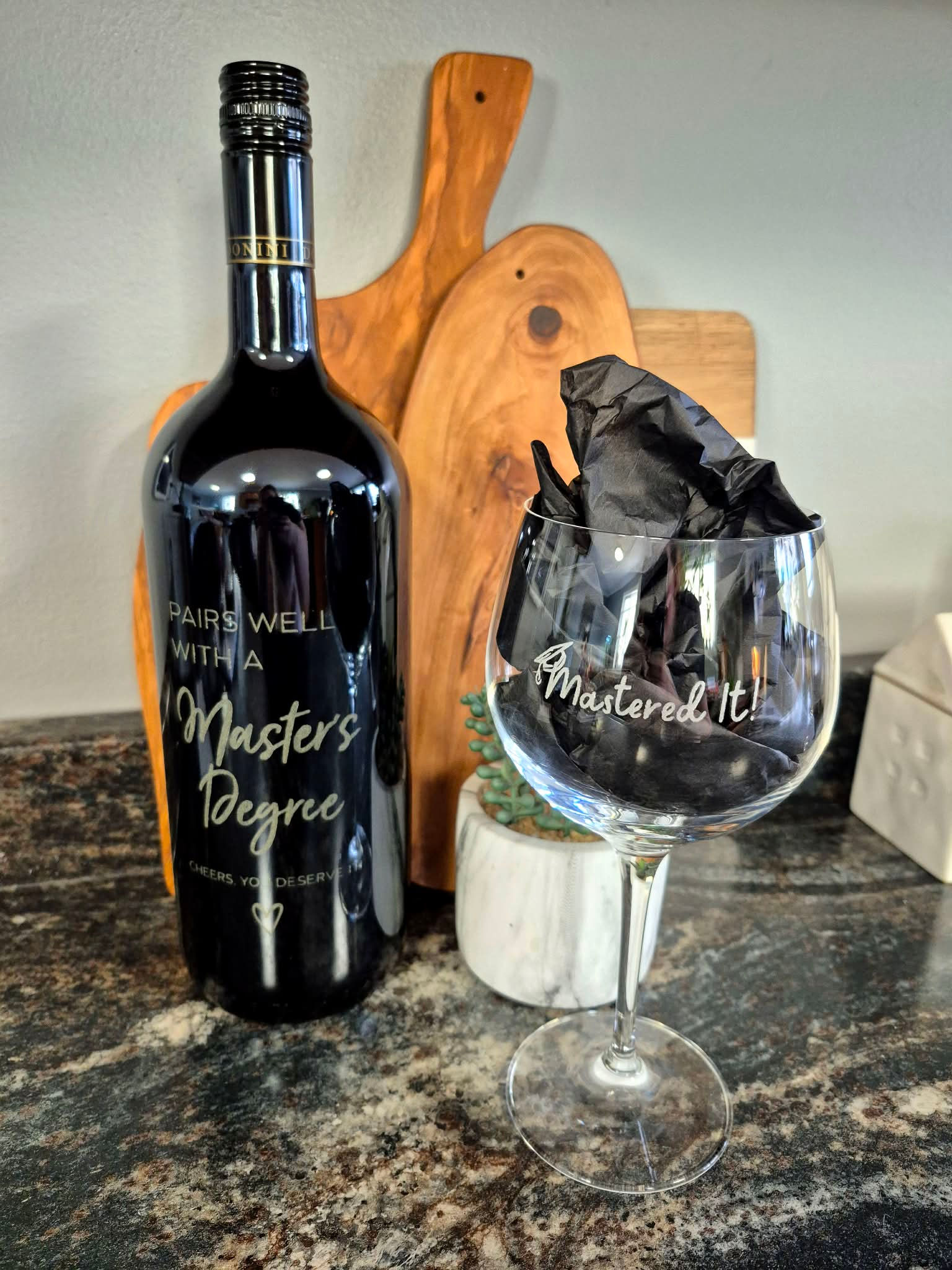 Wine bottle labeled 'Master's Degree' with dark glass