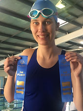 Special olympics swimming competition after collecting my ribbons.