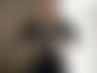 a female fashion model is wearing black gold brocade underbust corset costume